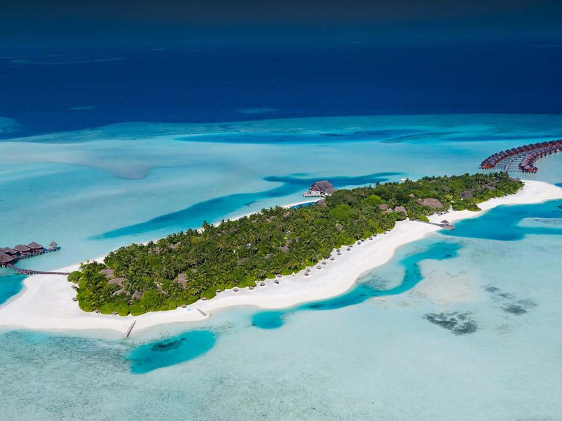 The long island and its rows of water villas, from high above