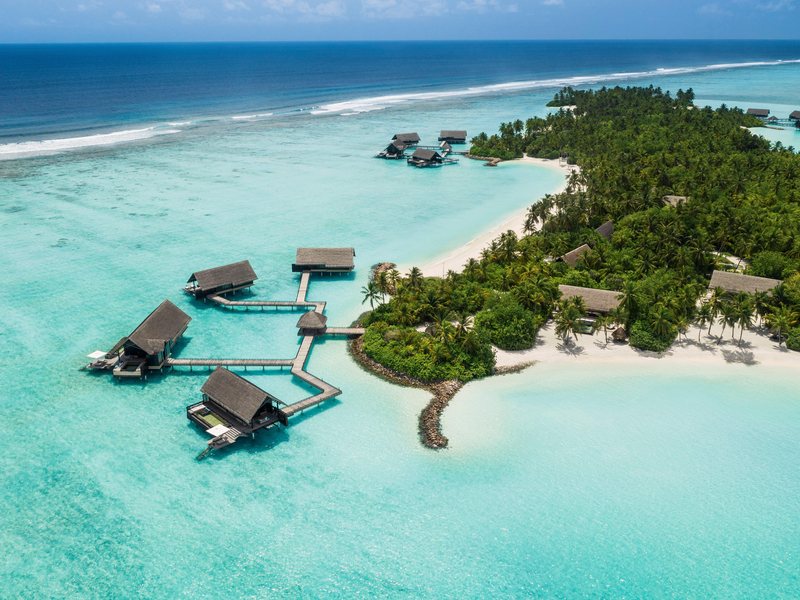 The island and its water villas, from the air