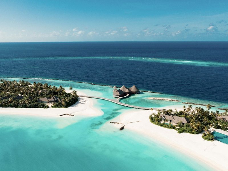 Two islands and the thatched restaurant between them, from the air
