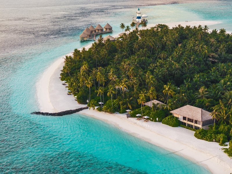 The island, its beach and sandbank, from the air