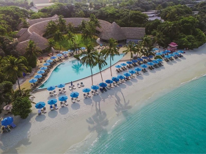 The main pool and loungers along the beach, from the air