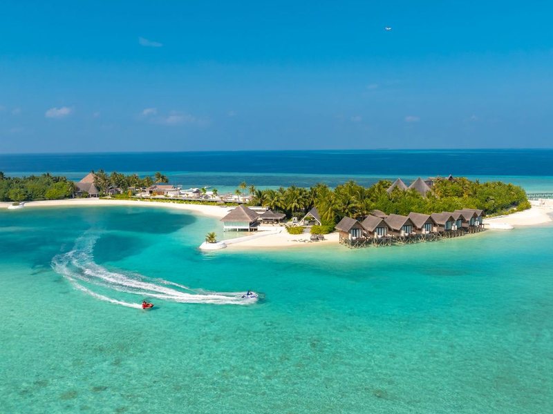 The island and its overwater villas, from the air