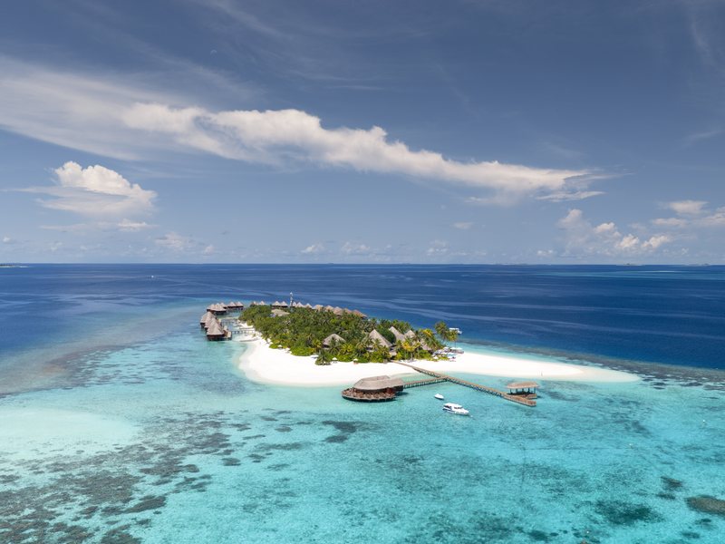The small round island on its reef, from high above
